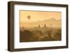 Hot air balloons fly over the temples of Bagan at sunrise on a misty morning, Myanmar-Tim Mannakee-Framed Photographic Print