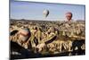 Hot Air Balloons Flying Among Rock Formations at Sunrise in the Red Valley-Ben Pipe-Mounted Photographic Print