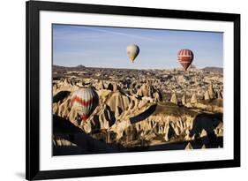 Hot Air Balloons Flying Among Rock Formations at Sunrise in the Red Valley-Ben Pipe-Framed Photographic Print