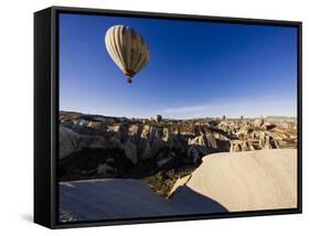 Hot Air Balloons Flying Among Rock Formations at Sunrise in the Red Valley-Ben Pipe-Framed Stretched Canvas