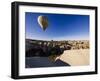 Hot Air Balloons Flying Among Rock Formations at Sunrise in the Red Valley-Ben Pipe-Framed Photographic Print