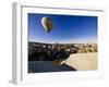 Hot Air Balloons Flying Among Rock Formations at Sunrise in the Red Valley-Ben Pipe-Framed Photographic Print