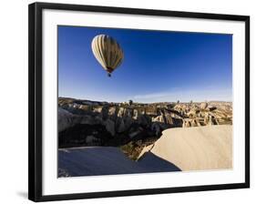 Hot Air Balloons Flying Among Rock Formations at Sunrise in the Red Valley-Ben Pipe-Framed Photographic Print