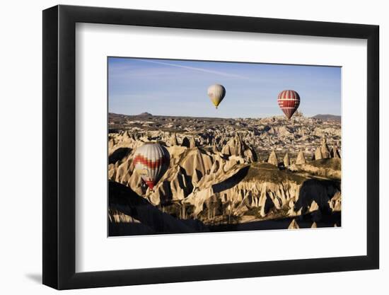 Hot Air Balloons Flying Among Rock Formations at Sunrise in the Red Valley-Ben Pipe-Framed Photographic Print