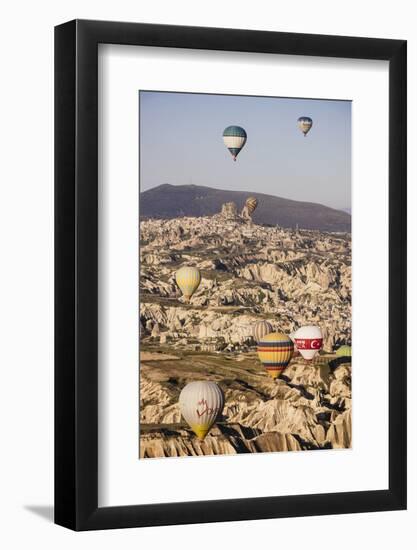 Hot Air Balloons Flying Among Rock Formations at Sunrise in the Red Valley-Ben Pipe-Framed Photographic Print