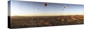 Hot Air Balloons over Landscape at Sunrise, Cappadocia, Central Anatolia Region, Turkey-null-Stretched Canvas