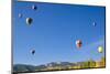 Hot Air Balloons Rise Above Aspen Groves in Snowmass Village, Colorado-Kent Harvey-Mounted Photographic Print