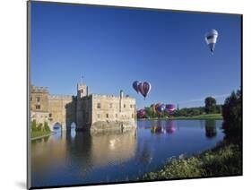 Hot Air Balloons Taking Off from Leeds Castle Grounds, Kent, England, United Kingdom, Europe-Nigel Blythe-Mounted Photographic Print