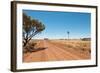 Hot Dusty Road across Flat Landscape with Water Vane-Will Wilkinson-Framed Photographic Print