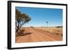 Hot Dusty Road across Flat Landscape with Water Vane-Will Wilkinson-Framed Photographic Print