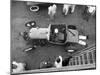 Hot Rodder Tuning Up His Car Before a Race-Ralph Crane-Mounted Photographic Print