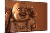 Hotei or the Laughing Buddha is a Wooden Statue on a Brown Background..-null-Mounted Photographic Print