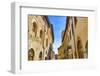 Hotel and bars on Medieval street, San Gimignano, Tuscany, Italy.-William Perry-Framed Photographic Print