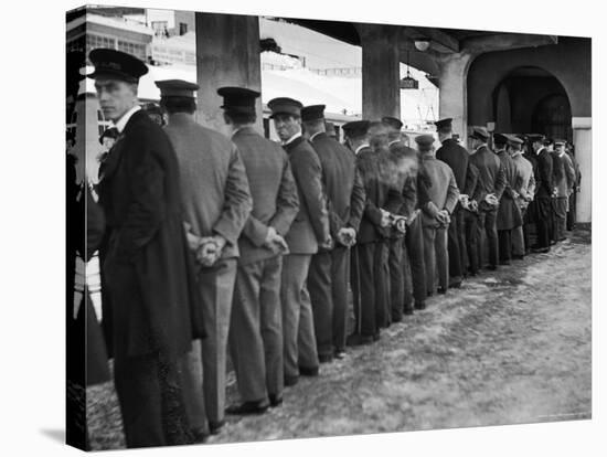 Hotel Porters Waiting For Zurich Arosa Train Arrival-Alfred Eisenstaedt-Stretched Canvas