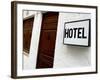 Hotel Sign on a Wall Near a Door-null-Framed Photographic Print