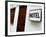 Hotel Sign on a Wall Near a Door-null-Framed Photographic Print