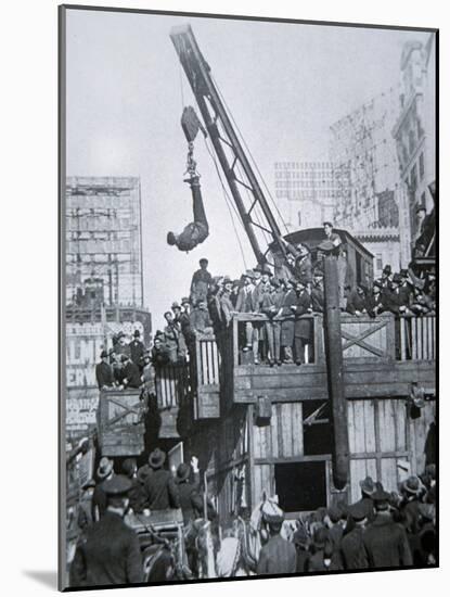 Houdini Escaping from a Strait-jacket While Suspended from a Crane in New York City-null-Mounted Giclee Print