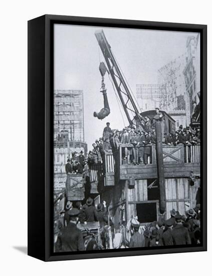 Houdini Escaping from a Strait-jacket While Suspended from a Crane in New York City-null-Framed Stretched Canvas