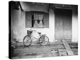 House and Bicycle, Hanoi, Vietnam-Walter Bibikow-Stretched Canvas