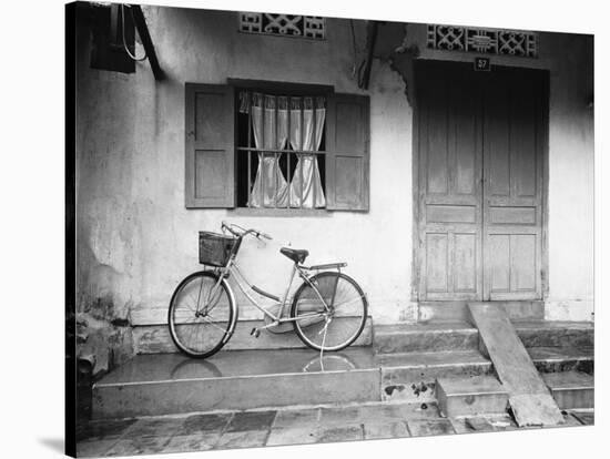 House and Bicycle, Hanoi, Vietnam-Walter Bibikow-Stretched Canvas