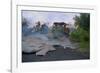 House Being Consumed by Floating Lava-Paul Richards-Framed Photographic Print