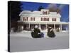 House in a Snow Covered Landscape-null-Stretched Canvas