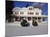 House in a Snow Covered Landscape-null-Mounted Photographic Print