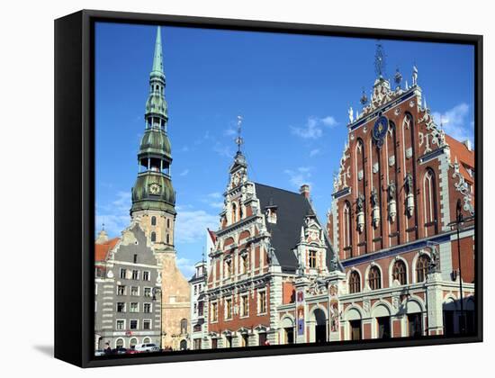 House of Blackheads and St Peters Church, Riga, Latvia-Peter Thompson-Framed Stretched Canvas