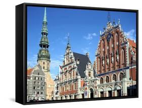 House of Blackheads and St Peters Church, Riga, Latvia-Peter Thompson-Framed Stretched Canvas