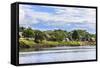 Houses along a riverbank in the Amazon basin, Peru.-Tom Norring-Framed Stretched Canvas