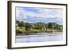 Houses along a riverbank in the Amazon basin, Peru.-Tom Norring-Framed Photographic Print