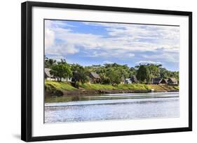 Houses along a riverbank in the Amazon basin, Peru.-Tom Norring-Framed Photographic Print