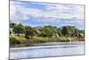 Houses along a riverbank in the Amazon basin, Peru.-Tom Norring-Mounted Photographic Print