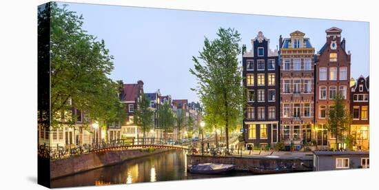 Houses Along Canal at Dusk at Intersection of Herengracht and Brouwersgracht, Amsterdam-null-Stretched Canvas