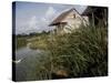 Houses Along the Louisiana Bayou are Seen-null-Stretched Canvas