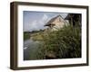 Houses Along the Louisiana Bayou are Seen-null-Framed Premium Photographic Print