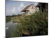 Houses Along the Louisiana Bayou are Seen-null-Mounted Premium Photographic Print