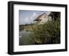 Houses Along the Louisiana Bayou are Seen-null-Framed Photographic Print