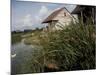 Houses Along the Louisiana Bayou are Seen-null-Mounted Photographic Print