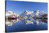 Houses and Mountains Reflected in the Waters of Henningsvaer Fjord. Lofoten Islands. Norway. Europe-ClickAlps-Stretched Canvas