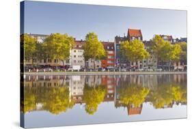 Houses and Shops Reflecting in a Pond, Cologne, North Rhine-Westphalia, Germany, Europe-Julian Elliott-Stretched Canvas