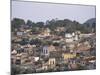 Houses in City Centre, Santiago De Cuba, Cuba, West Indies, Central America-Tony Waltham-Mounted Photographic Print