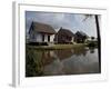 Houses in the Bayou Country of Louisiana-null-Framed Photographic Print