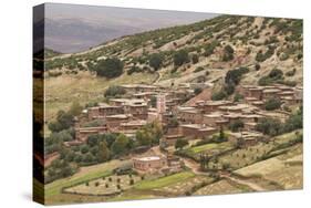 Houses made of mud and straw in the foothills of the Atlas mountains near Marrakech, Morocco.-Brenda Tharp-Stretched Canvas