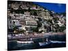 Houses Terraced into Rugged Amalfi Coastline, Boats in Foreground, Positano, Italy-Dallas Stribley-Stretched Canvas