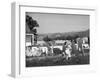 Housewife in Tygart Valley Removing Laundry from Clothesline, Her Young Daughter Stands Beside Her-Carl Mydans-Framed Photographic Print