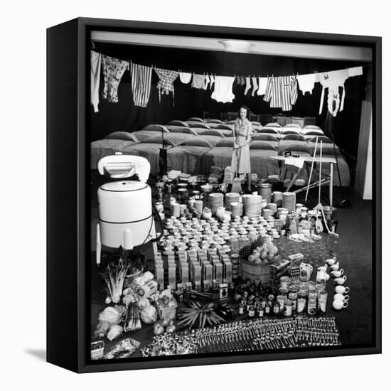 Housewife Marjorie McWeeney with Broom Amidst Display of Her Week's Housework, Bloomingdale's Store-Nina Leen-Framed Stretched Canvas