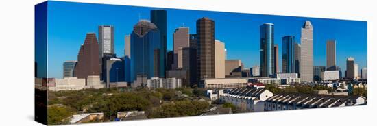 HOUSTON, TEXAS - High rise buildings in Houston cityscape illuminated at sunset, Texas, United S...-null-Stretched Canvas