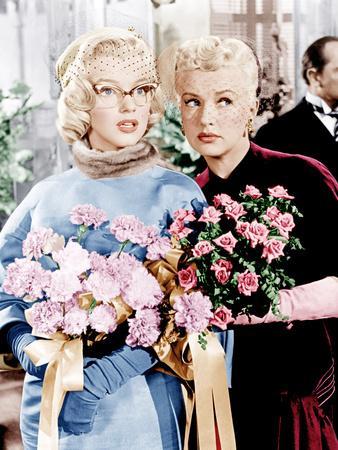 https://imgc.allpostersimages.com/img/posters/how-to-marry-a-millionaire-marilyn-monroe-betty-grable-1953_u-L-PJXOO10.jpg?artPerspective=n