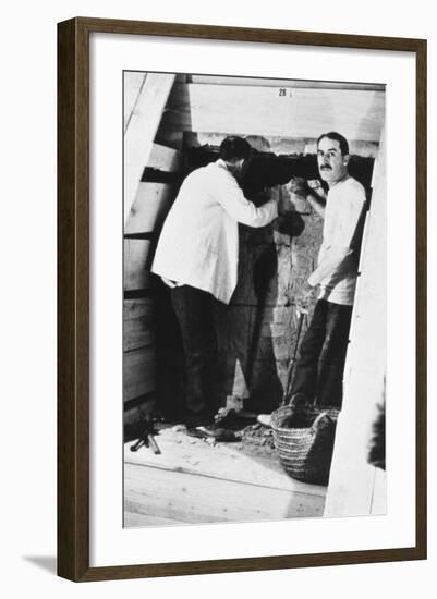 Howard Carter and a Colleague Excavating a Tomb in the Valley of the Kings, Egypt, 1922-Harry Burton-Framed Giclee Print